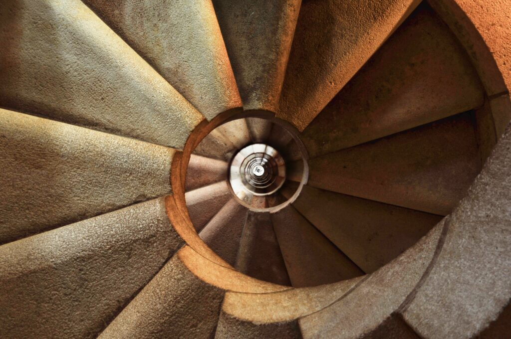 Image of a spiral staircase looking down.